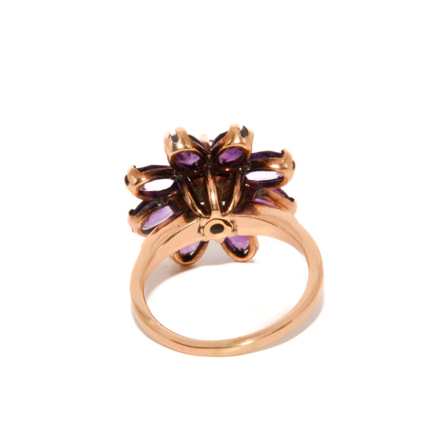 Vintage 14k Gold Amethyst Cluster Ring. Featuring a striking arrangement of deep purple amethysts, this bold ring demands attention with its vibrant purple tones and intricate craftsmanship.