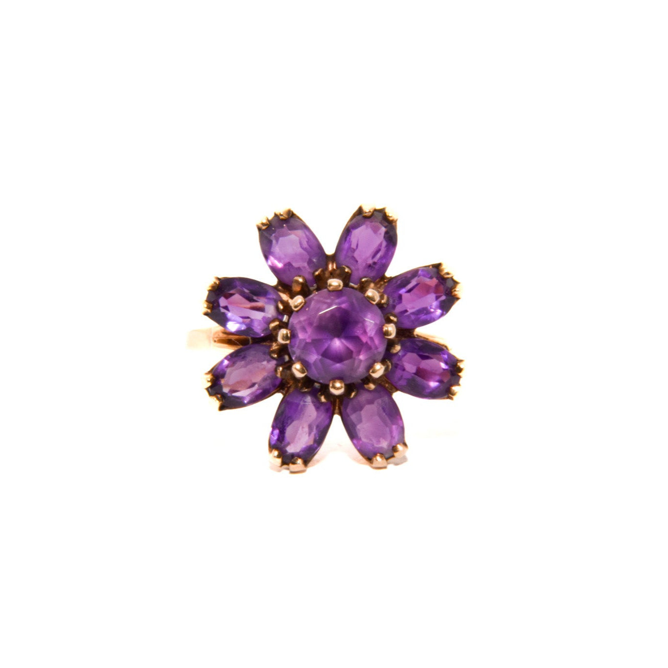 Vintage 14k Gold Amethyst Cluster Ring. Featuring a striking arrangement of deep purple amethysts, this bold ring demands attention with its vibrant purple tones and intricate craftsmanship.