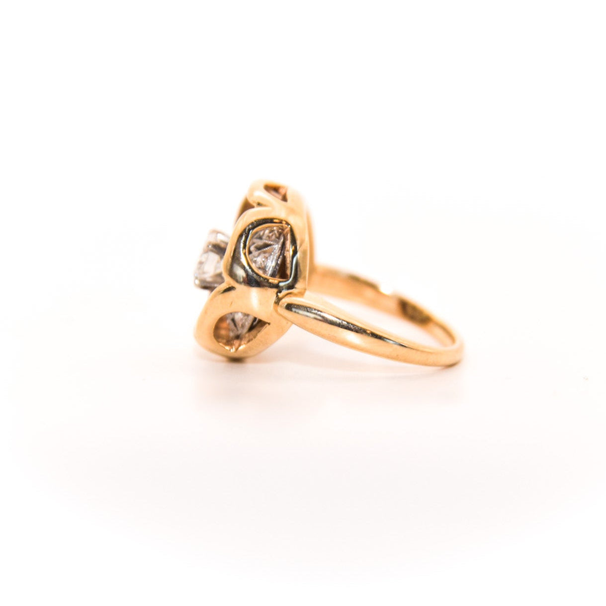 Vintage Diamond Ring, Where an Art Deco-era piece (once an earring or pendant!) finds new life. Featuring a stunning geometric design crafted with inspiration of this era's unmistakable flair, this ring showcases a central diamond surrounded by intricate patterns of smaller diamonds, creating a captivating display of light and brilliance.