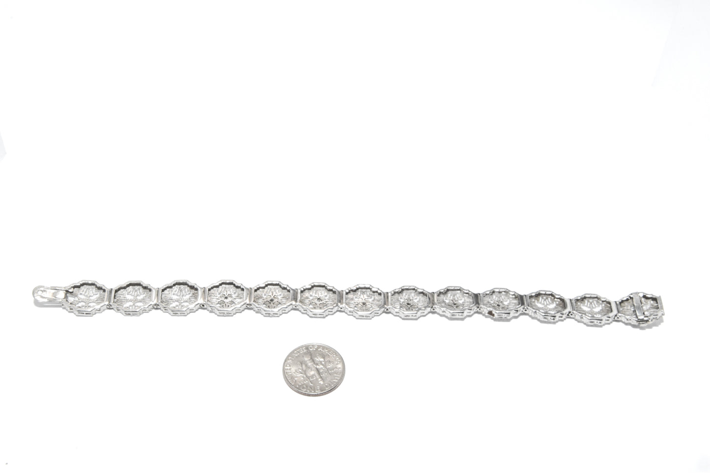 Antique Art Deco filigree bracelet Delicately crafted in 14K white gold with Sparkling diamond accents