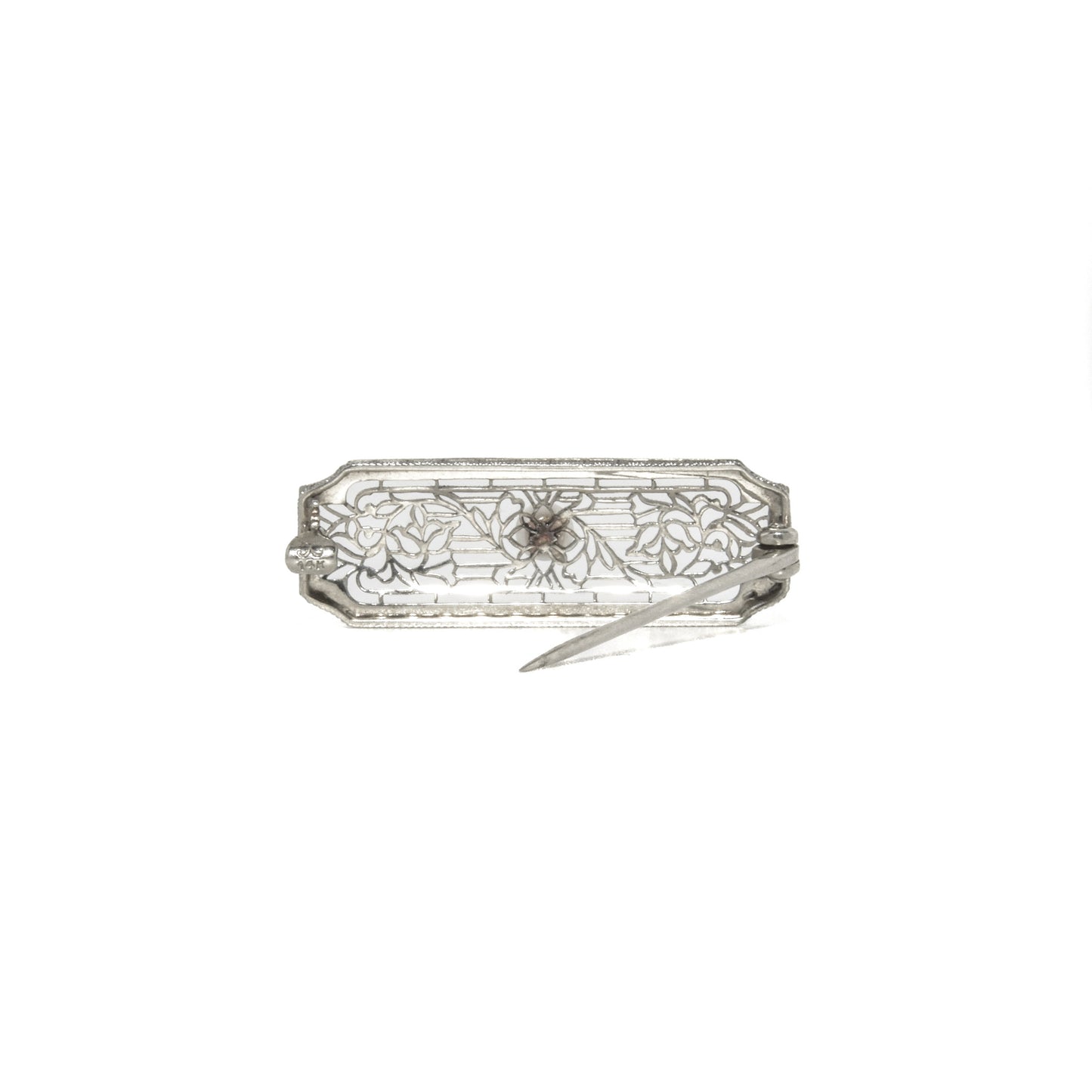 14k white gold art deco brooch with floral design on a white background