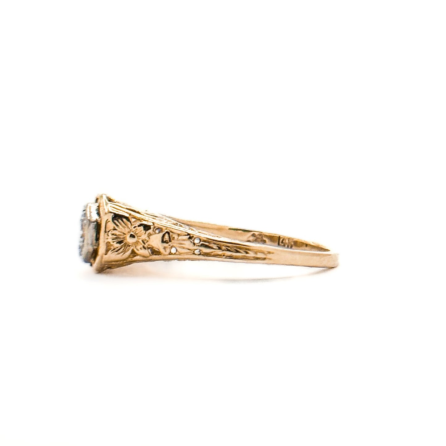 Antique Art Deco Diamond Filigree Ring. Featuring a dazzling diamond amidst an intricately detailed filigree design.