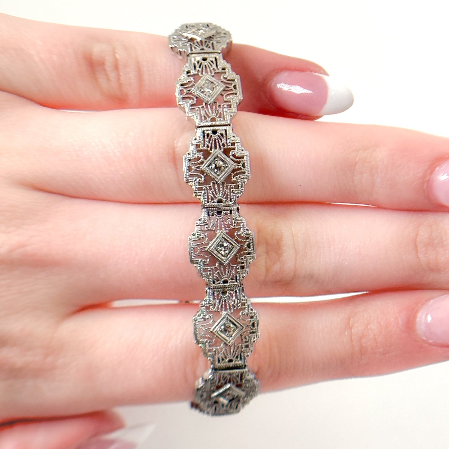 Antique Art Deco filigree bracelet Delicately crafted in 14K white gold with Sparkling diamond accents