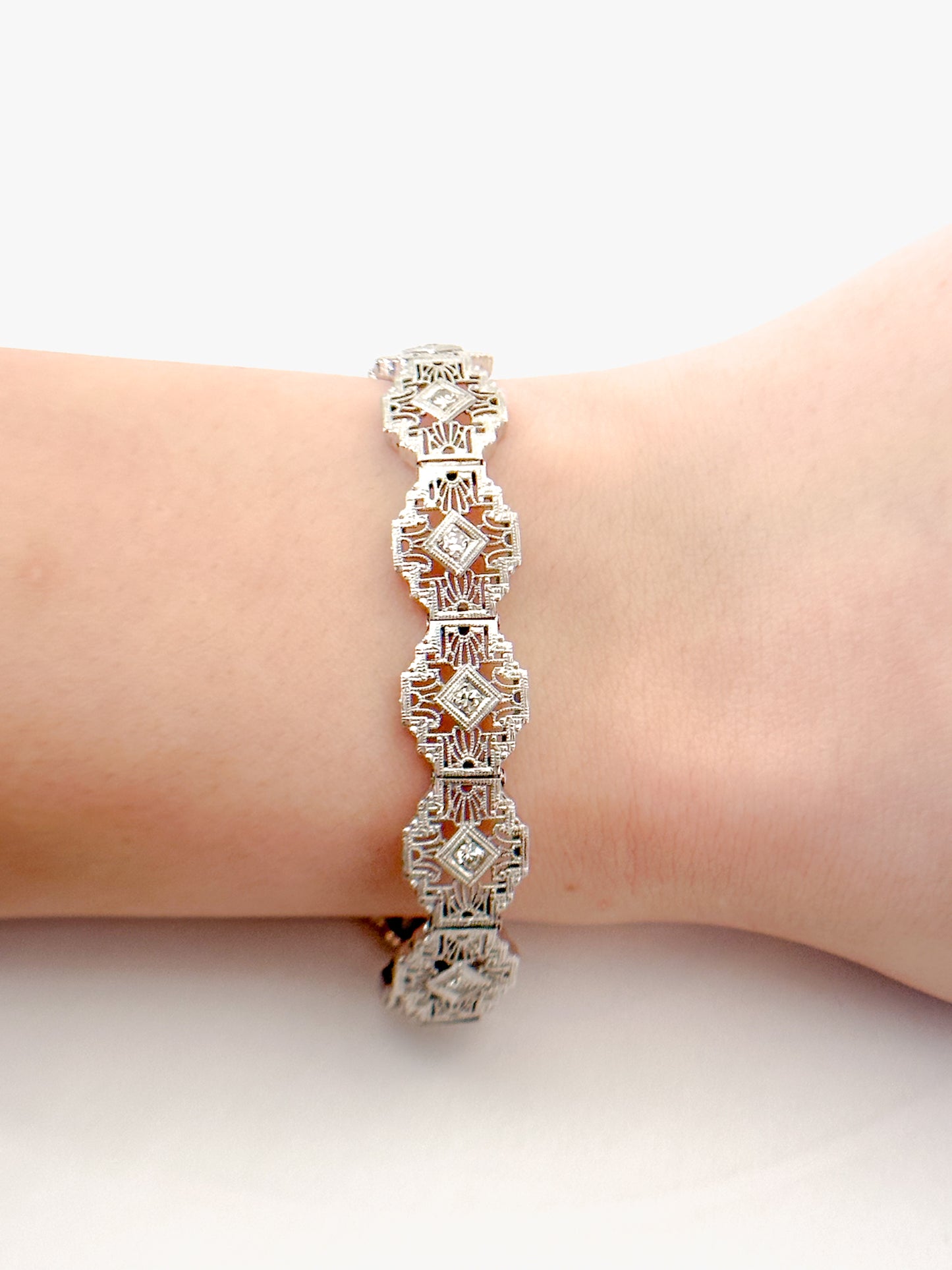 Antique Art Deco filigree bracelet Delicately crafted in 14K white gold with Sparkling diamond accents
