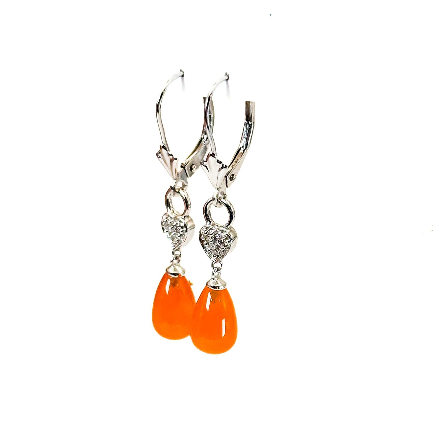A pair of 14K white gold dangle lever-back earrings featuring teardrop-shaped fire opals with heart-shaped and diamond accents accents on a white background.