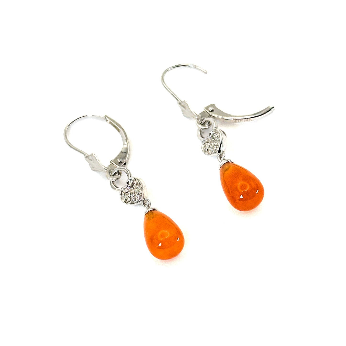 A pair of 14K white gold dangle lever-back earrings featuring teardrop-shaped fire opals with heart-shaped and diamond accents accents on a white background.