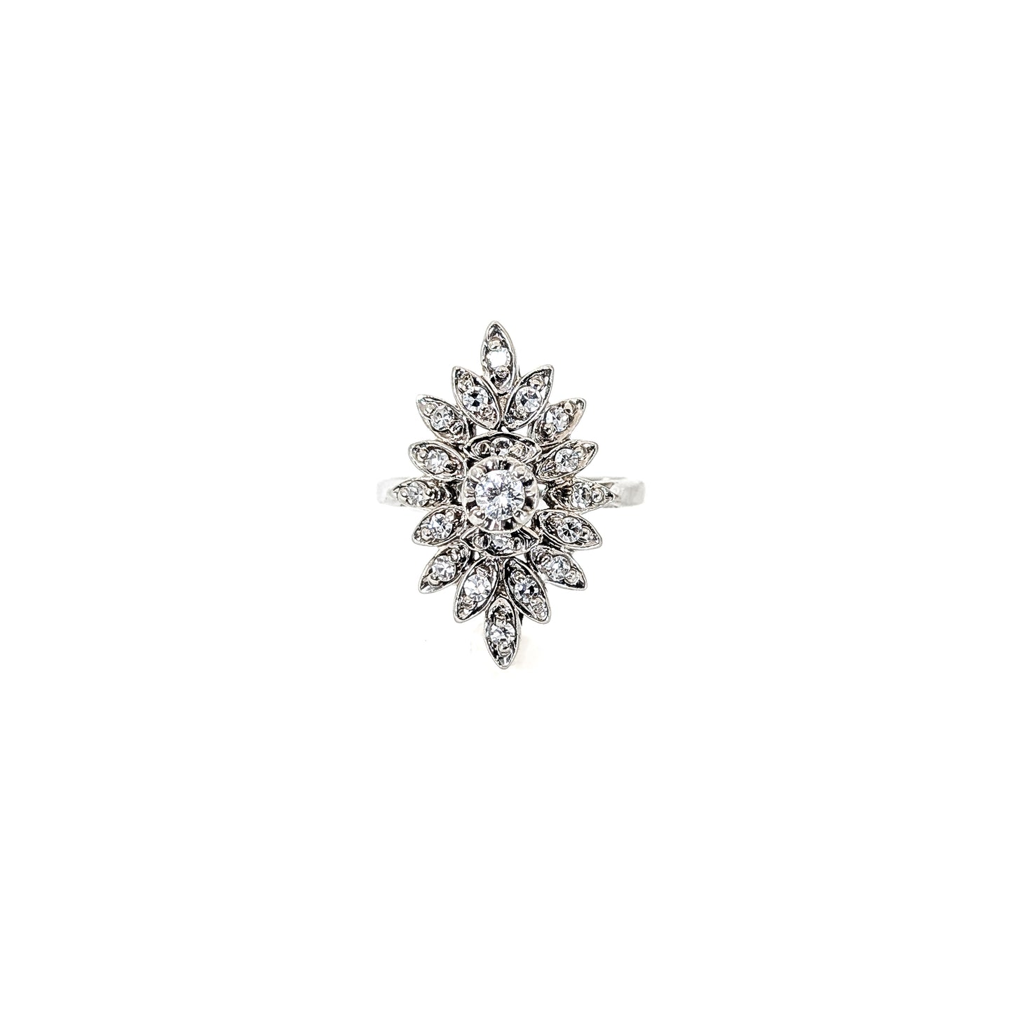 Luminous 14K white gold ring , the design features a brilliant round center diamond surrounded by an intricate halo of marquise-shaped with round diamond accents against a white background.