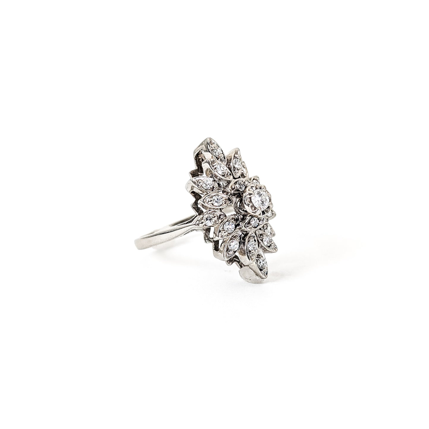 Luminous 14K white gold ring , the design features a brilliant round center diamond surrounded by an intricate halo of marquise-shaped with round diamond accents