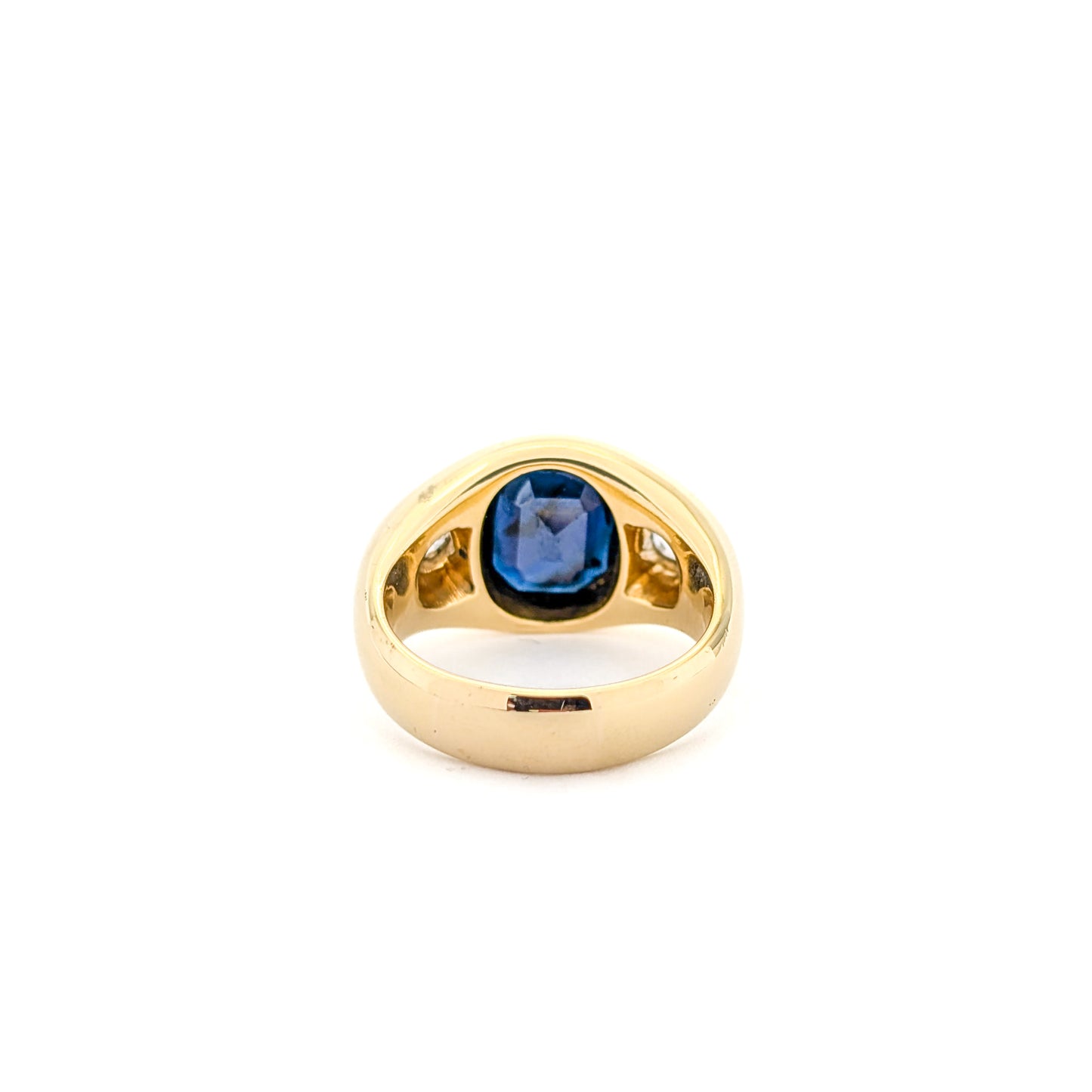 Italian crafted Antique Cushion Cut Blue Sapphire and Old Mine Cut Diamonds Dome Ring in 18K Gold with white background.