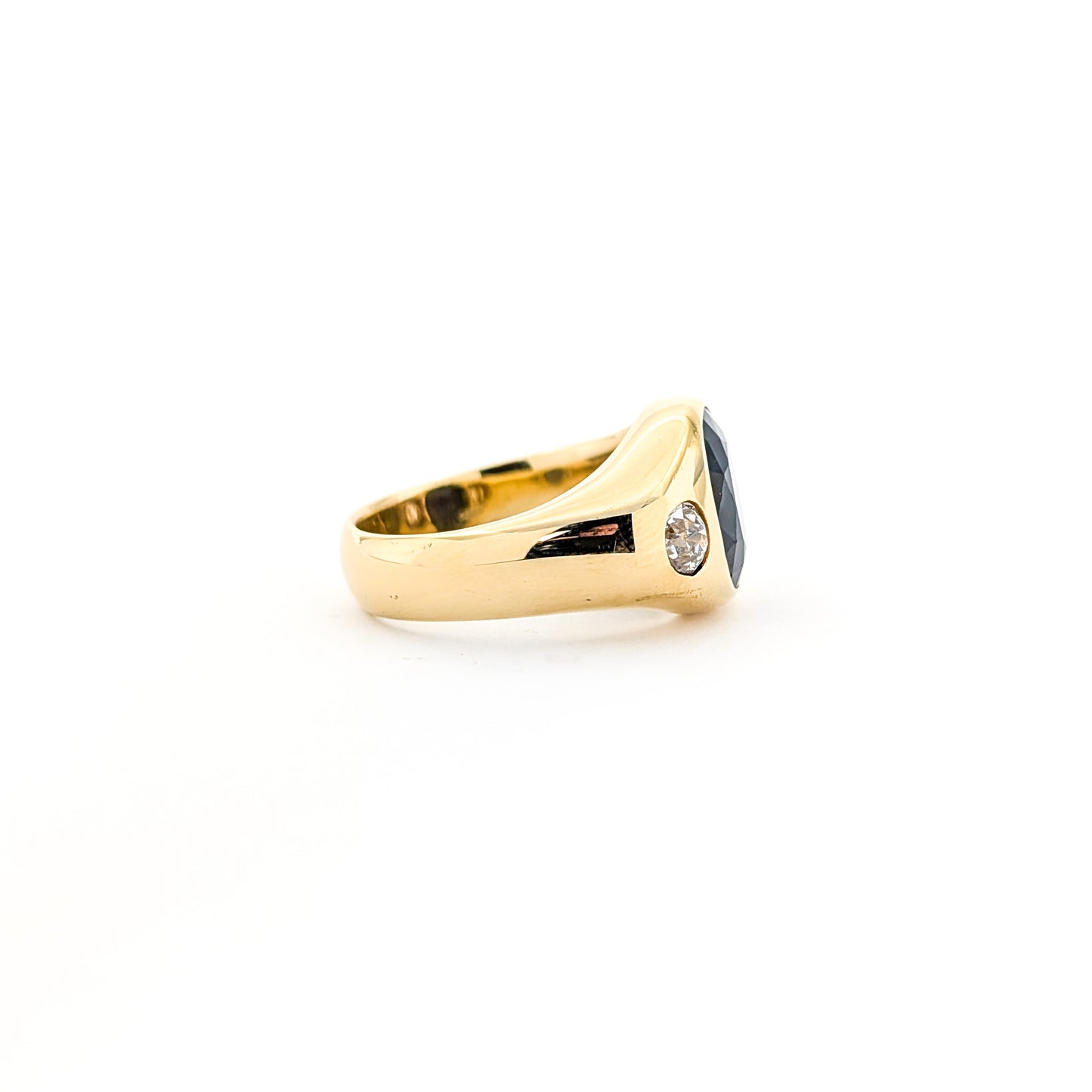 Italian crafted Antique Cushion Cut Blue Sapphire and Old Mine Cut Diamonds Dome Ring in 18K Gold with white background.