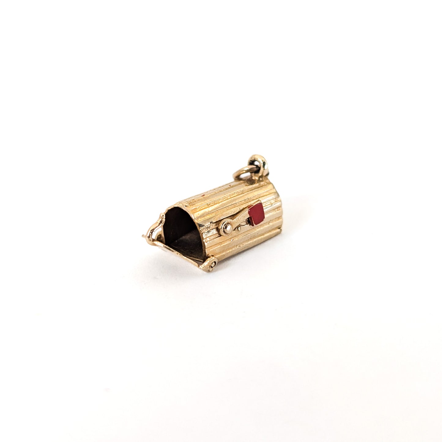14k Gold U.S. Mail mailbox charm with enamel detailing on a white background