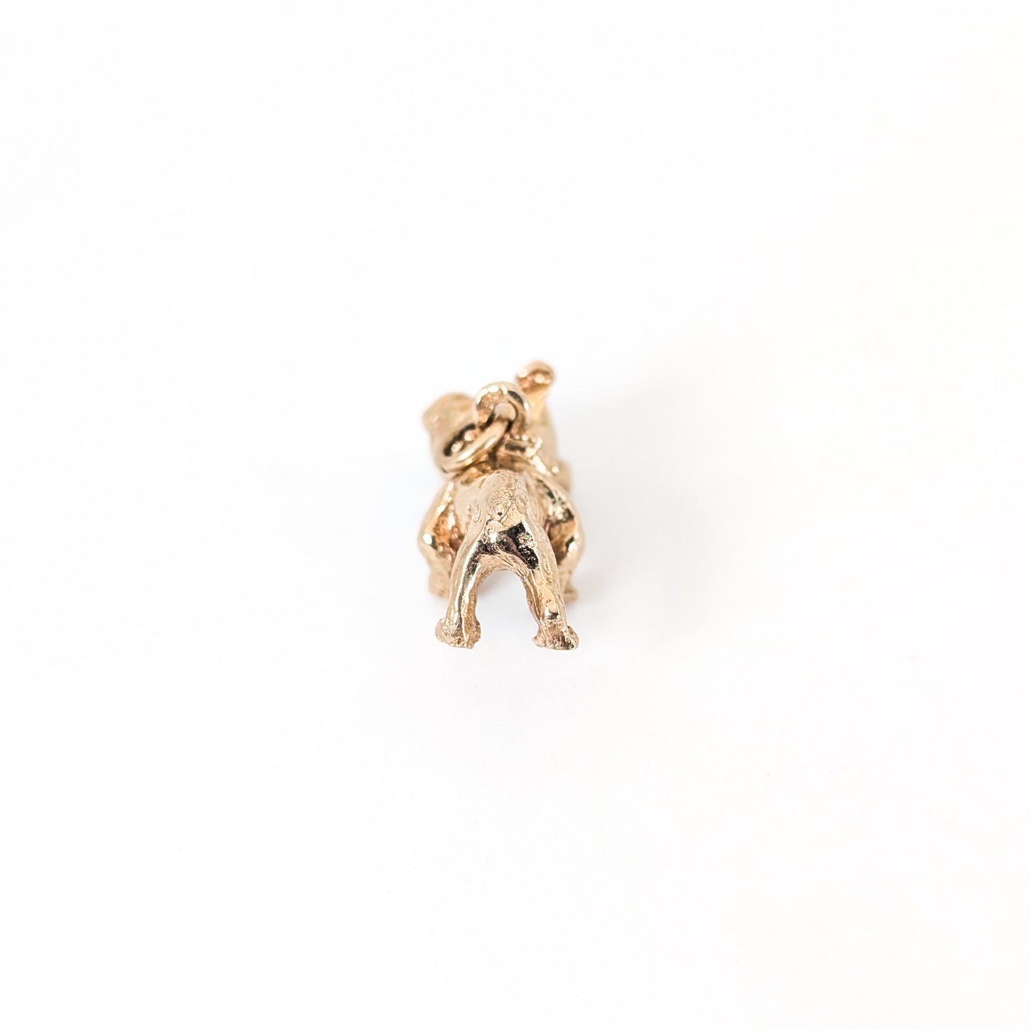 Vintage 14k Gold bulldog mechanical charm on a white background