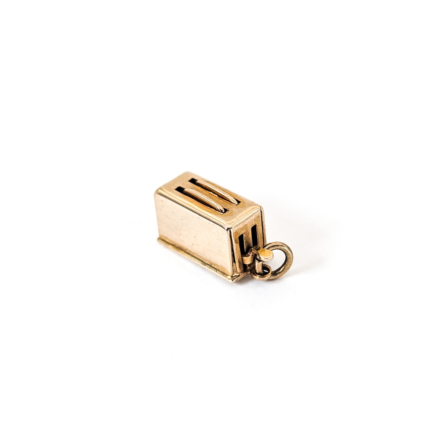 14k Gold toaster mechanical charm on a white background
