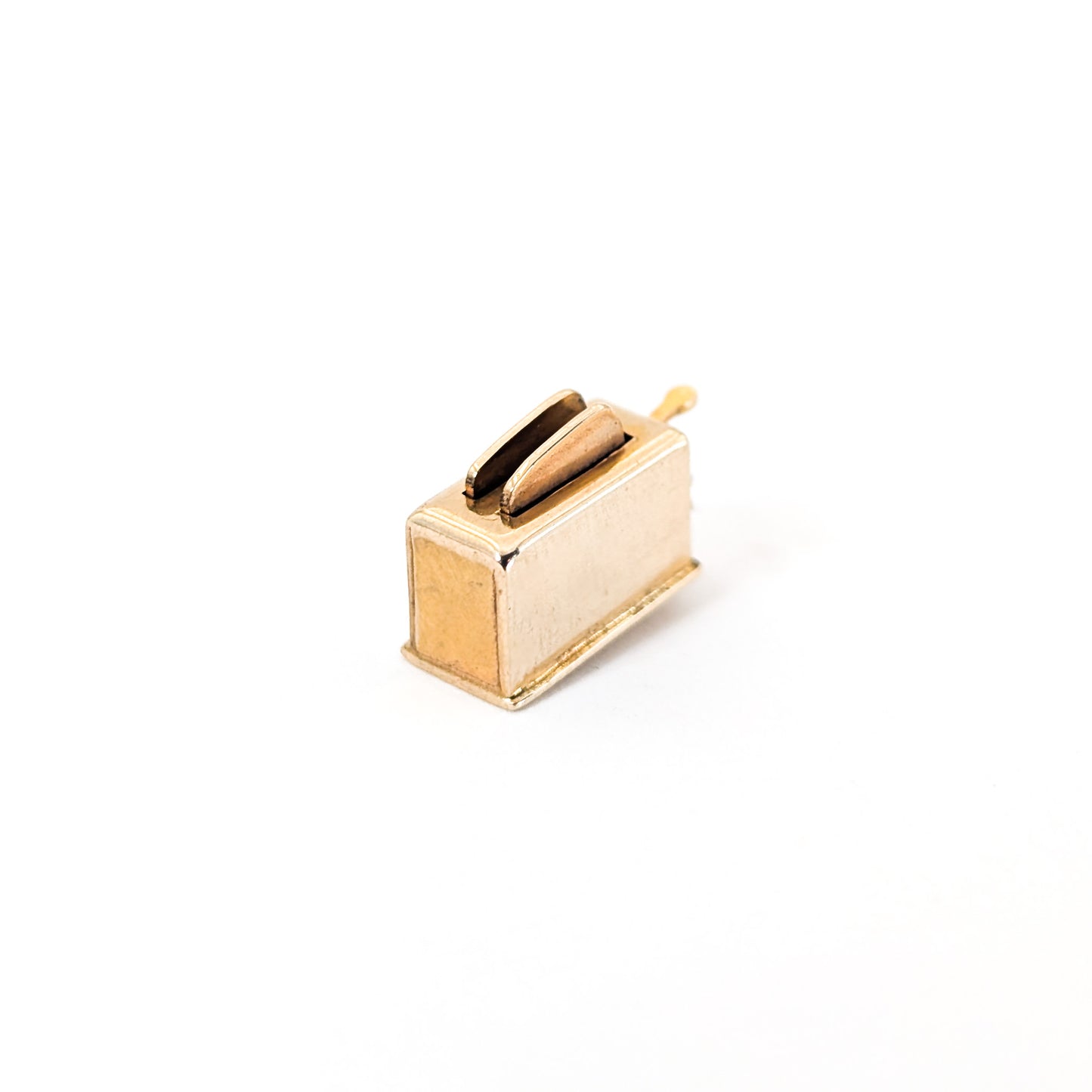 14k Gold toaster mechanical charm on a white background