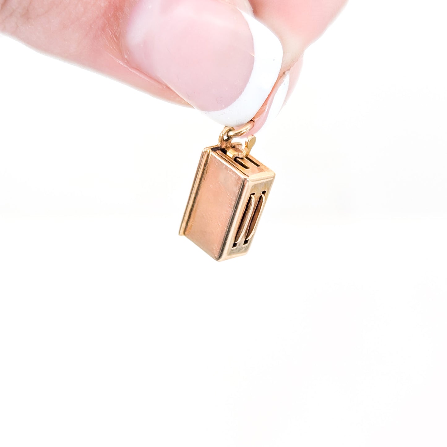 14k Gold toaster mechanical charm on a white background