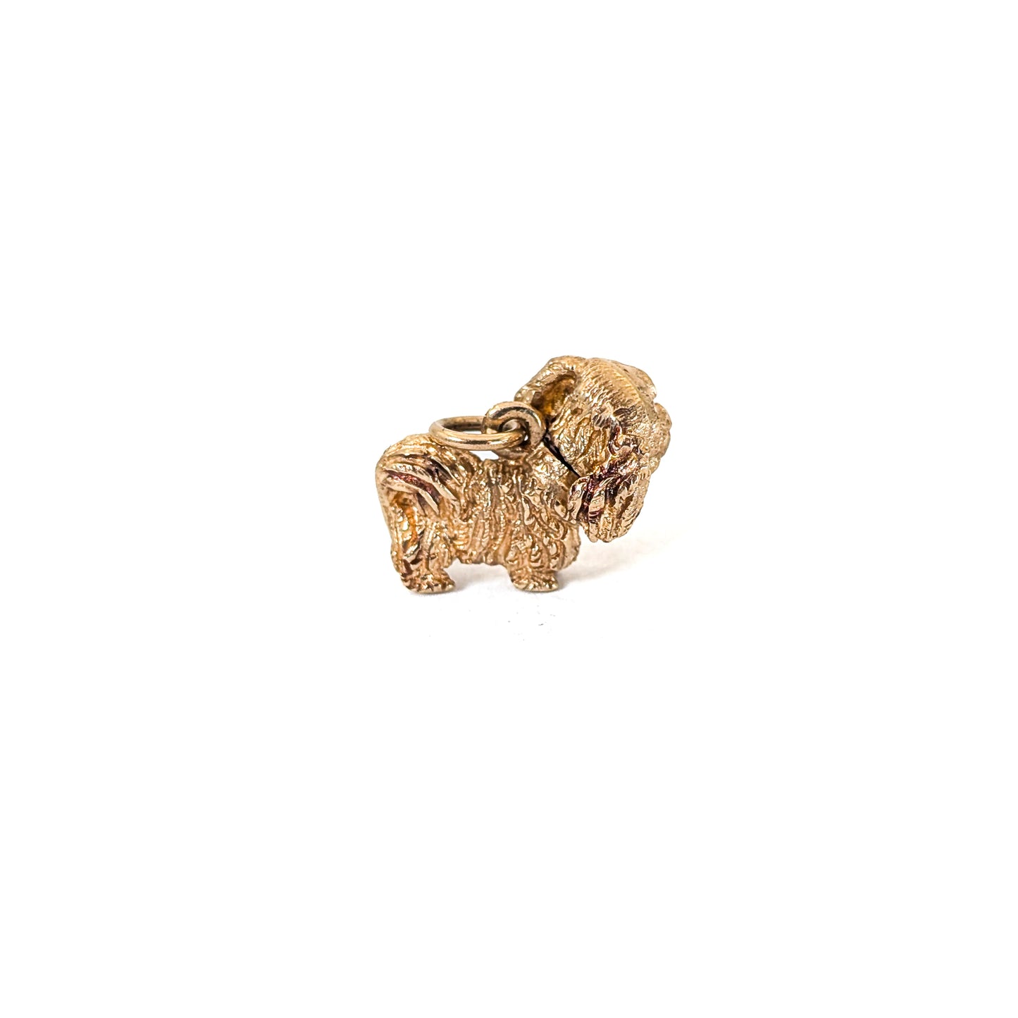 14k Gold Vintage Pekingese mechanical charm on a white background