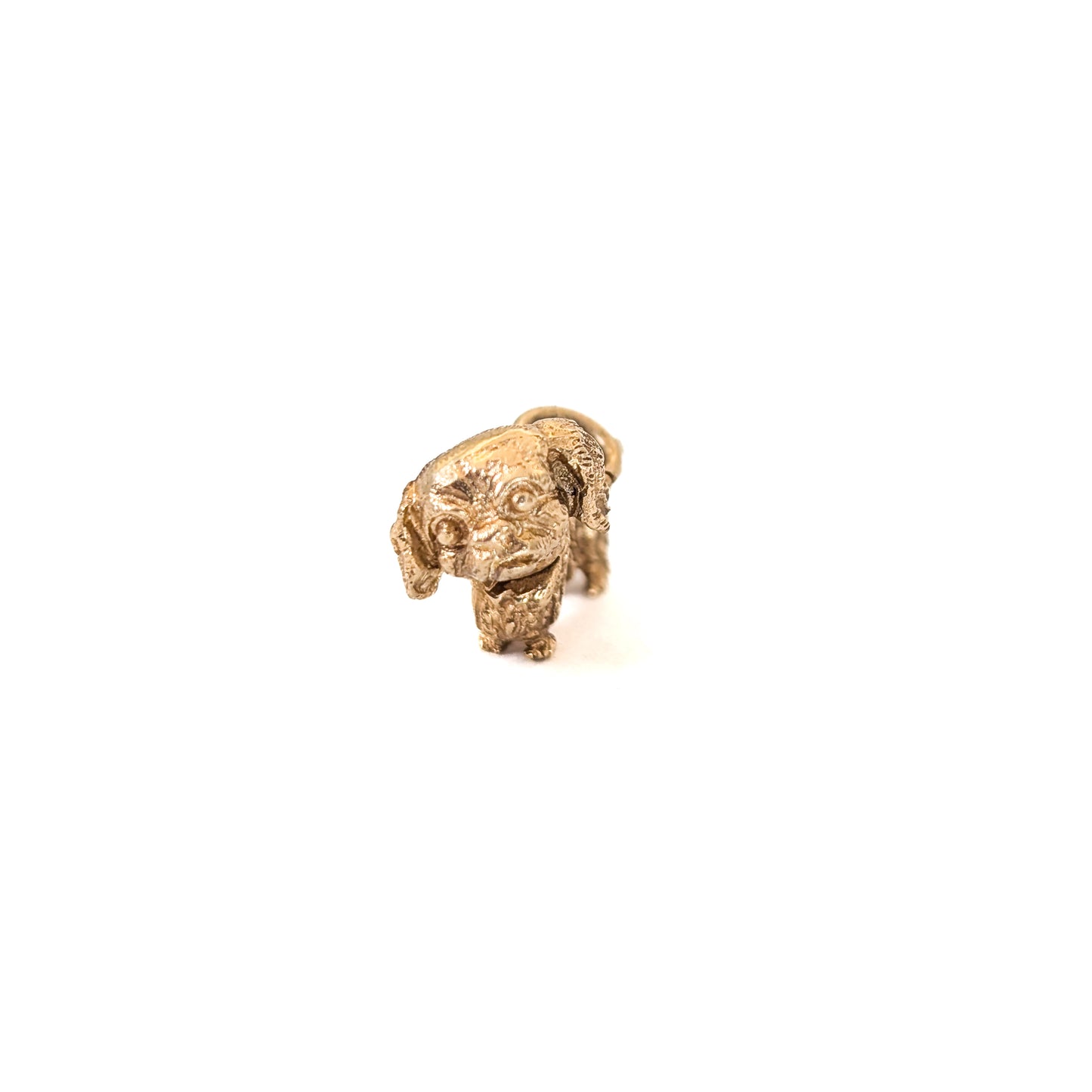 14k Gold Vintage Pekingese mechanical charm on a white background