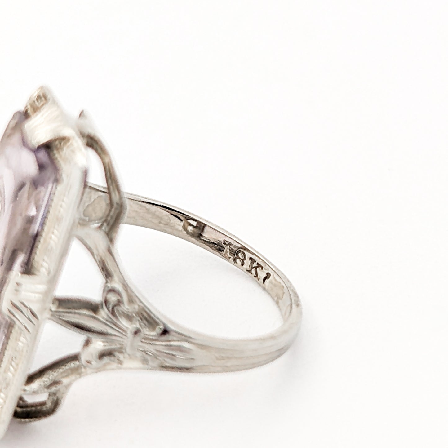 18K White Gold Ring with Amethyst and Diamond gemstones on a white background