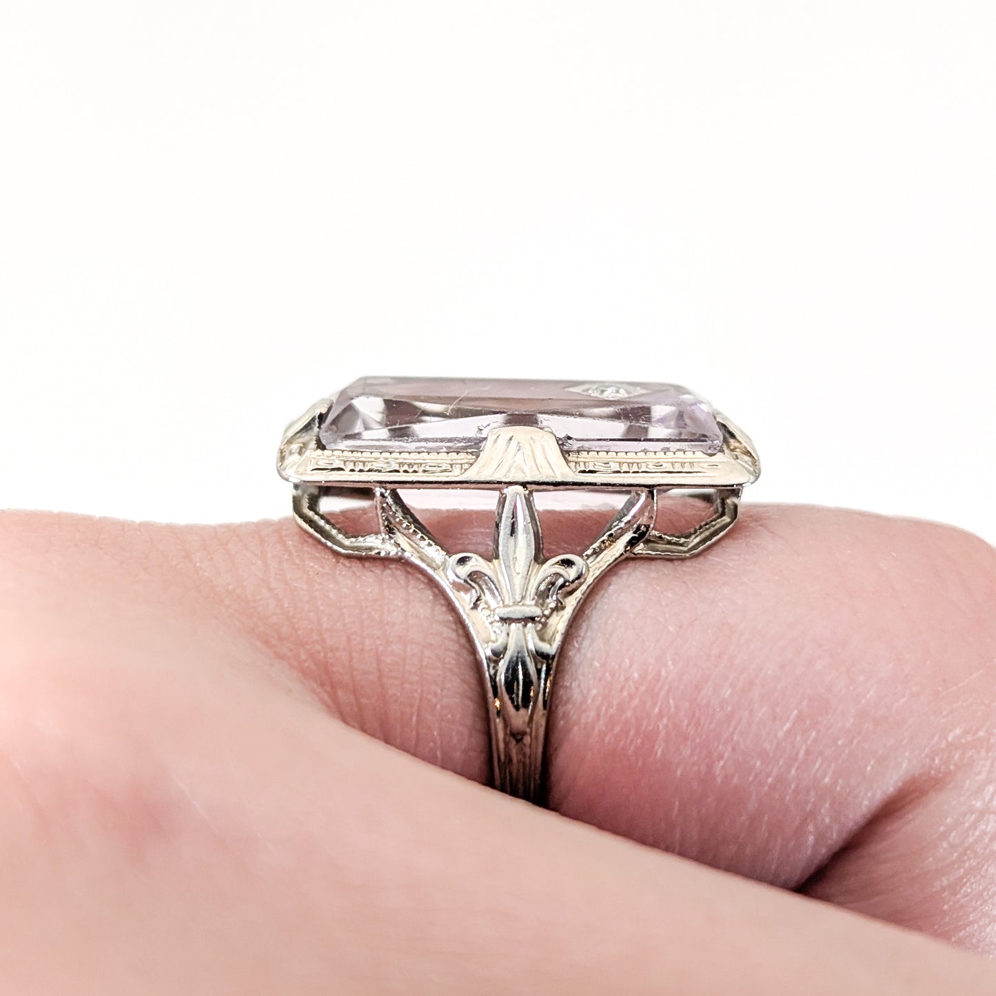 18K White Gold Ring with Amethyst and Diamond gemstones on a white background