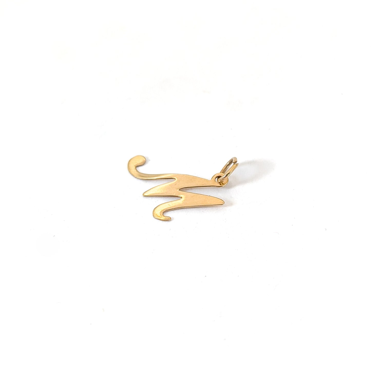 14k Gold pendant with the letter 'M' on a white background