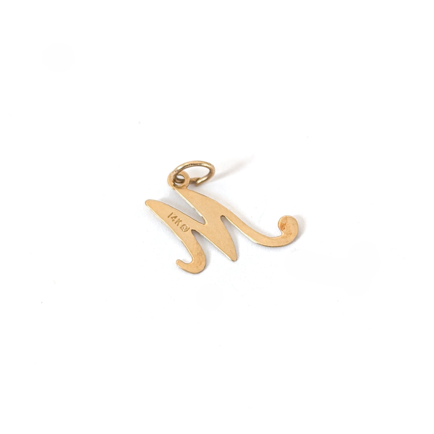 14k Gold pendant with the letter 'M' on a white background