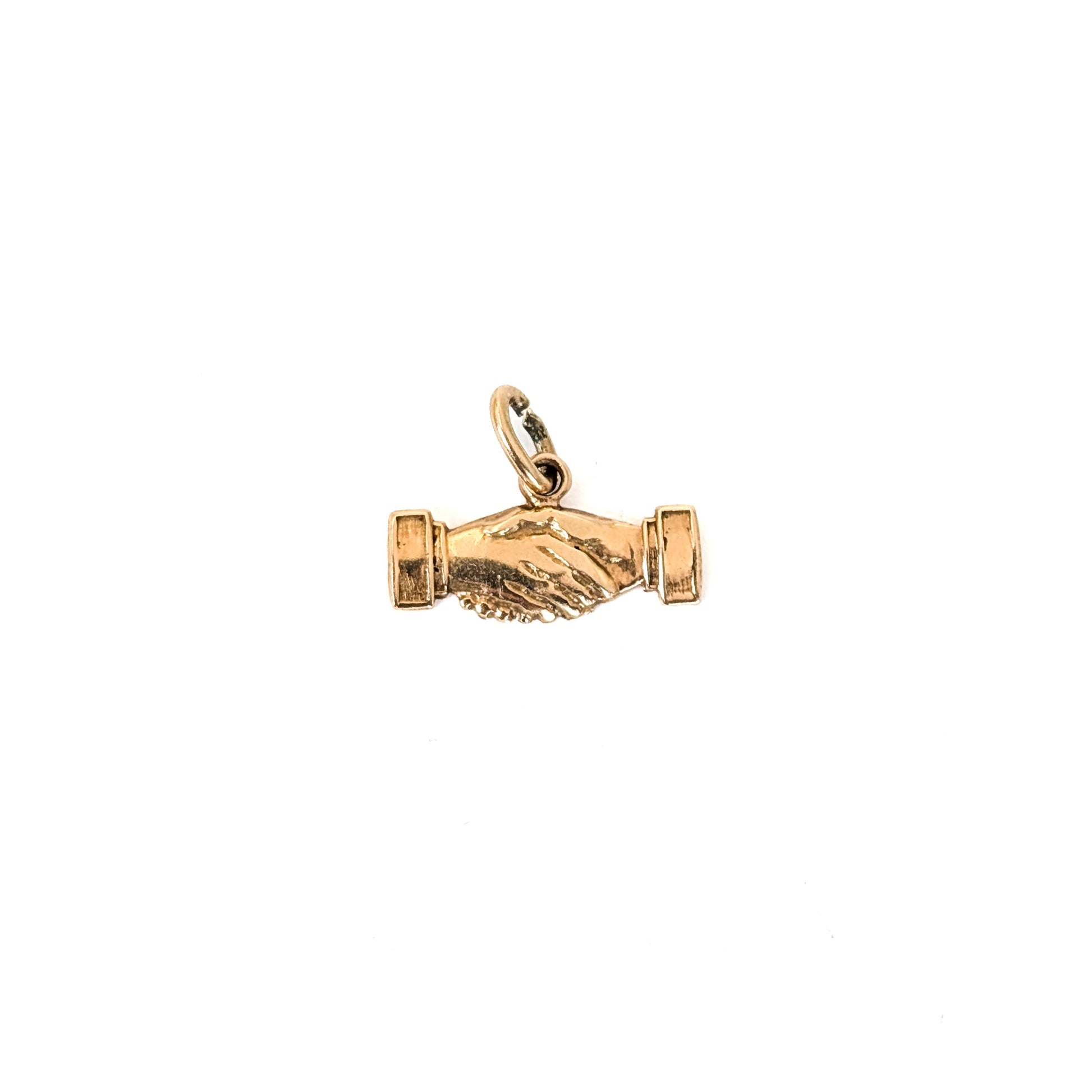 14K Gold handshake charm on a white background
