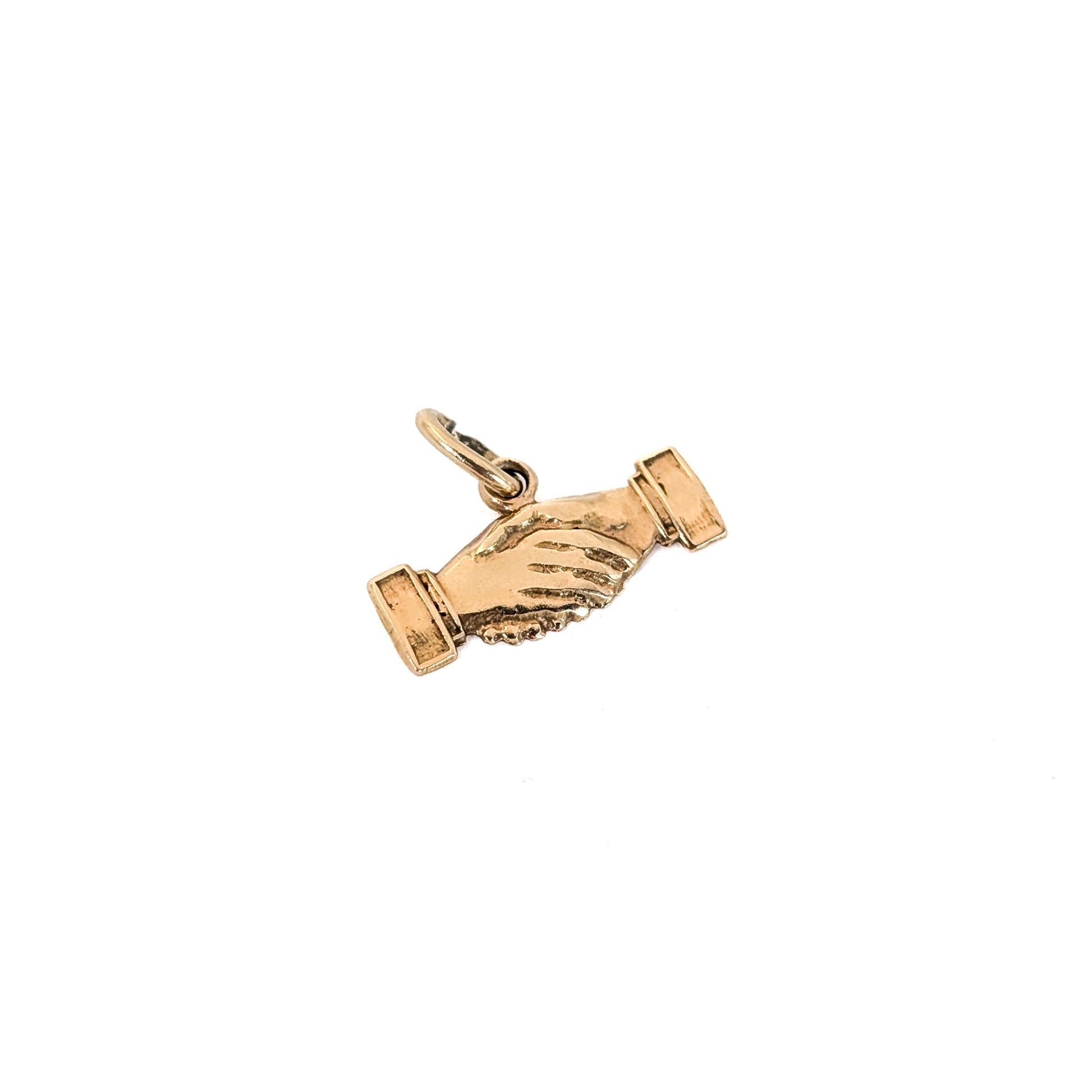 14K Gold handshake charm on a white background