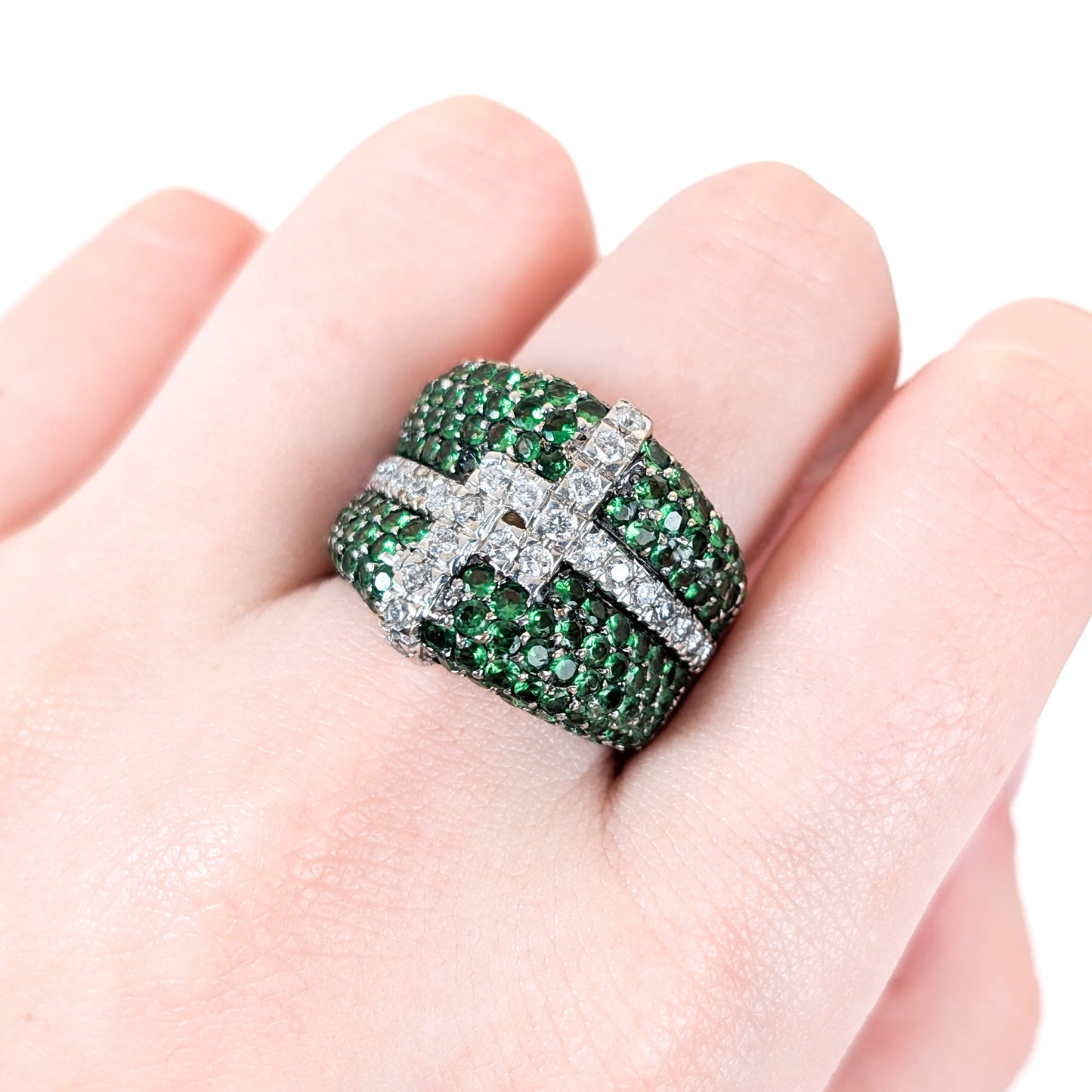 LeVian 14K White Gold Tsavorite Garnet & Diamond Wide Band Ring on a hand against a white background