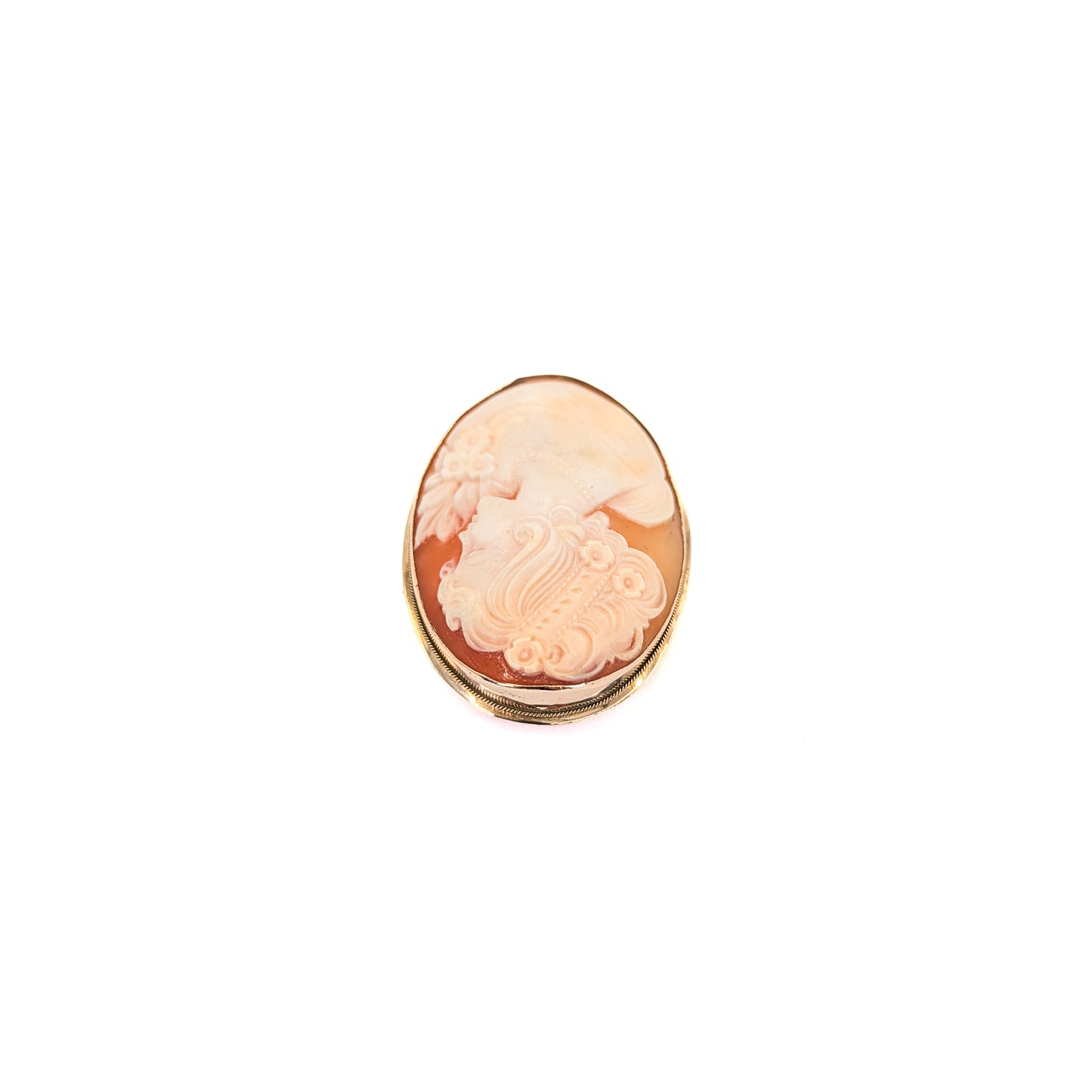 9k gold cameo brooch with a classical design on a white background
