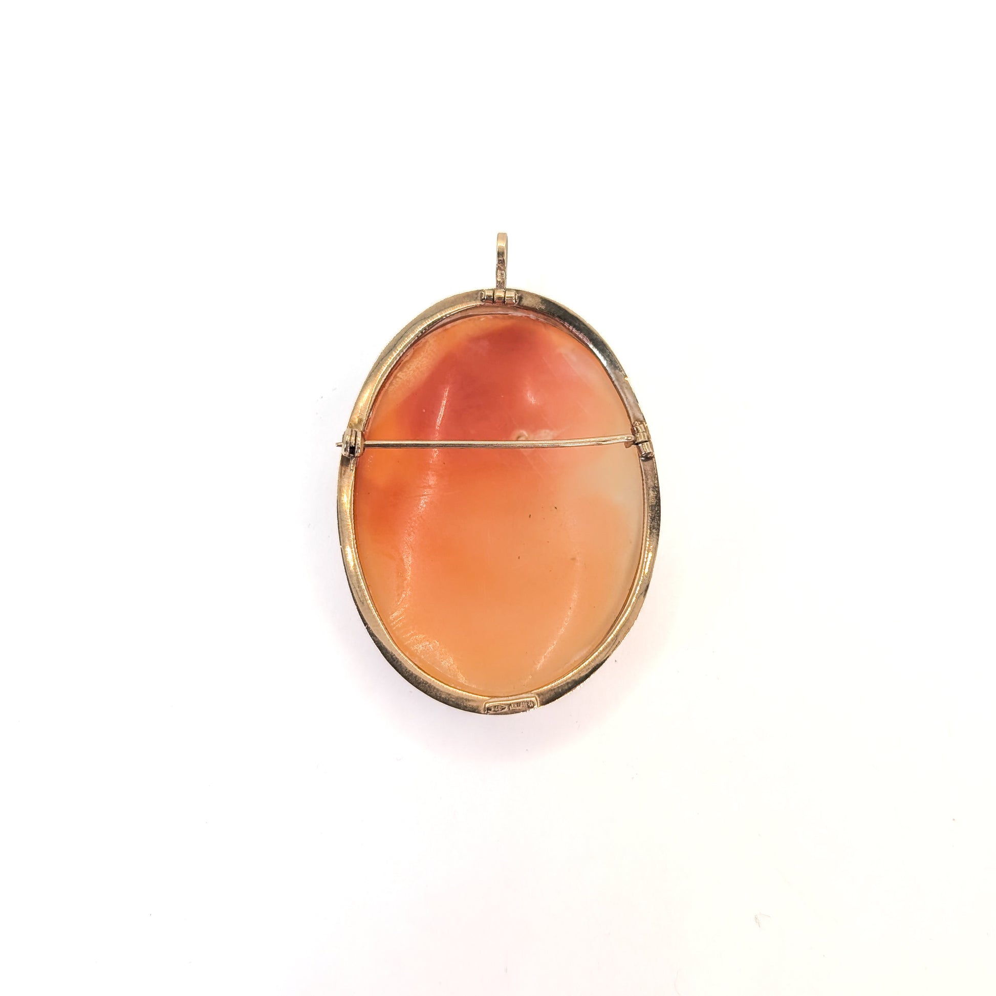 9k gold cameo brooch with a classical design on a white background