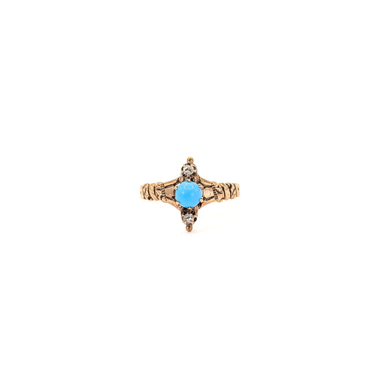 10k Vintage ring with turquoise stone and 2 rose cut diamonds on a white background