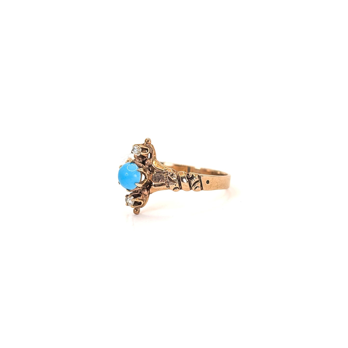 10k Vintage ring with turquoise stone and 2 rose cut diamonds on a white background