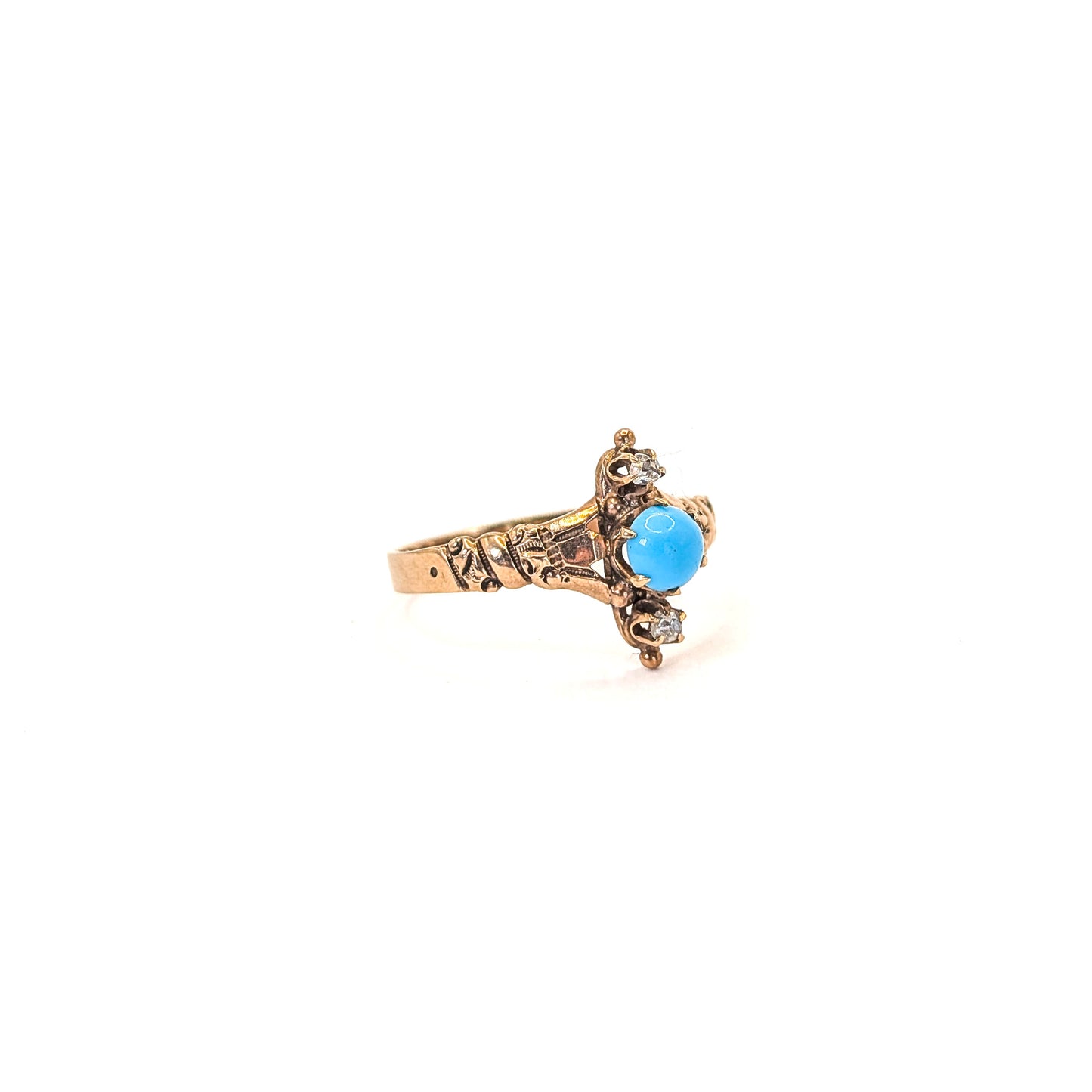 10k Vintage ring with turquoise stone and 2 rose cut diamonds on a white background