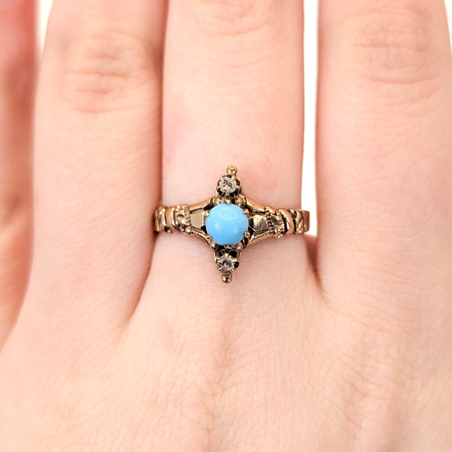 10k Vintage ring with turquoise stone and 2 rose cut diamonds on a white background