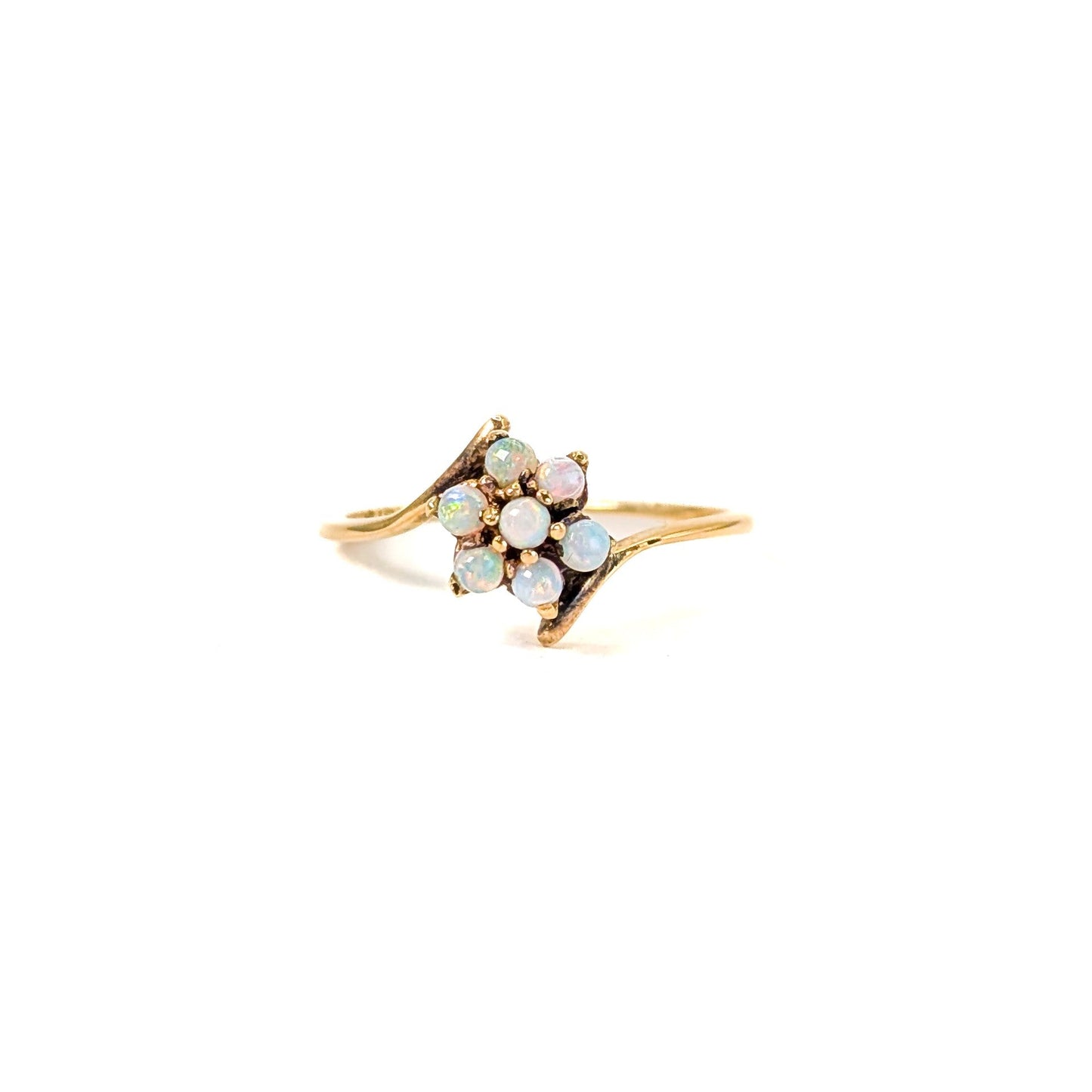 10K Gold ring with opal stones on a white background
