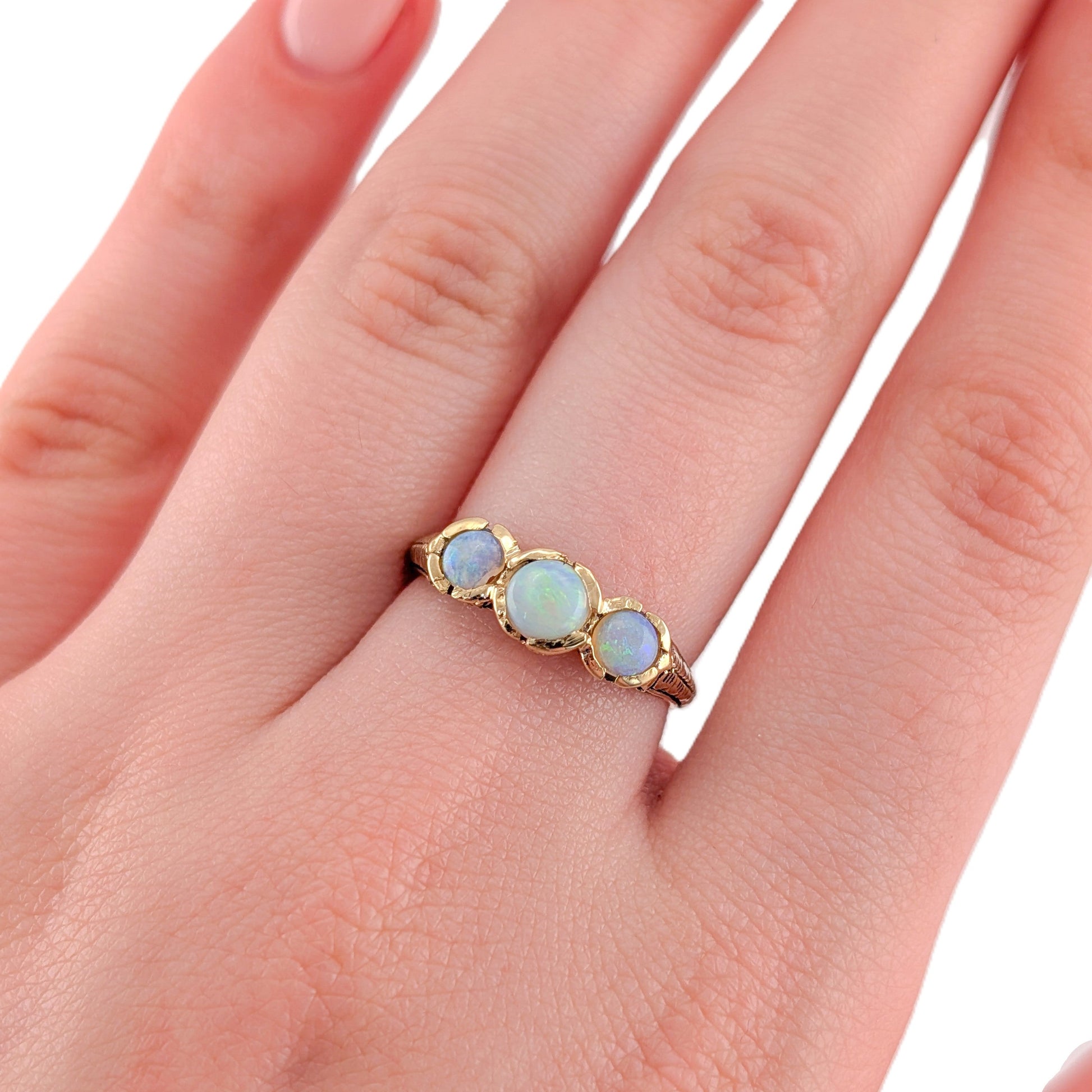 Vintage 9K Gold Three-Stone Opal Ring with Engraved Shoulders
