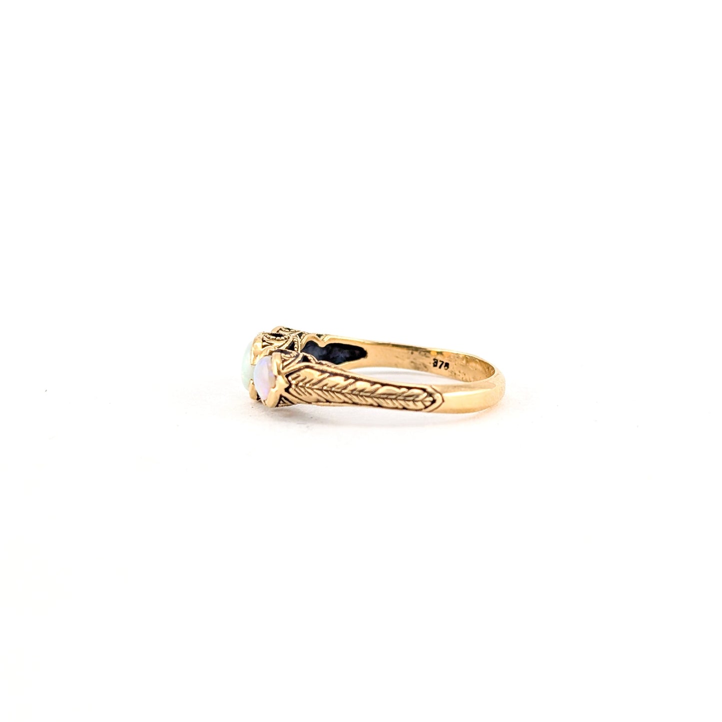 Vintage 9K Gold Three-Stone Opal Ring with Engraved Shoulders
