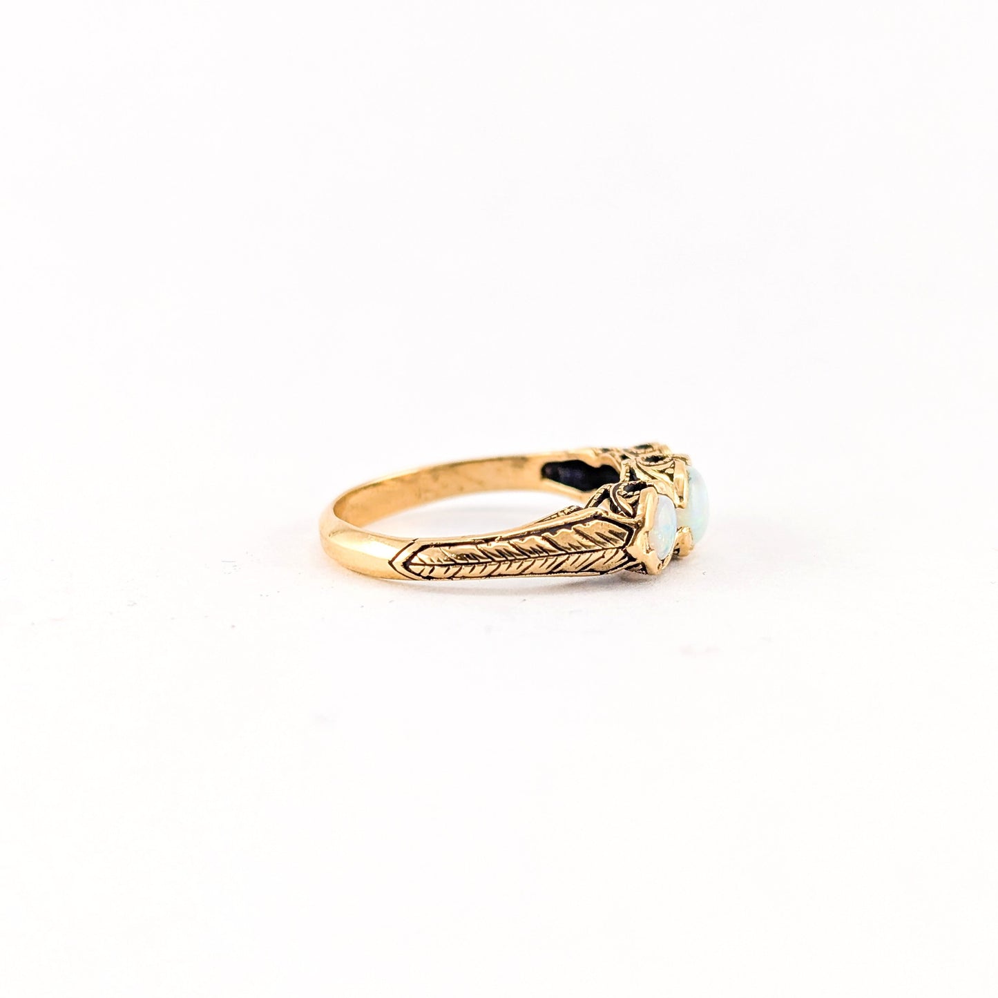 Vintage 9K Gold Three-Stone Opal Ring with Engraved Shoulders