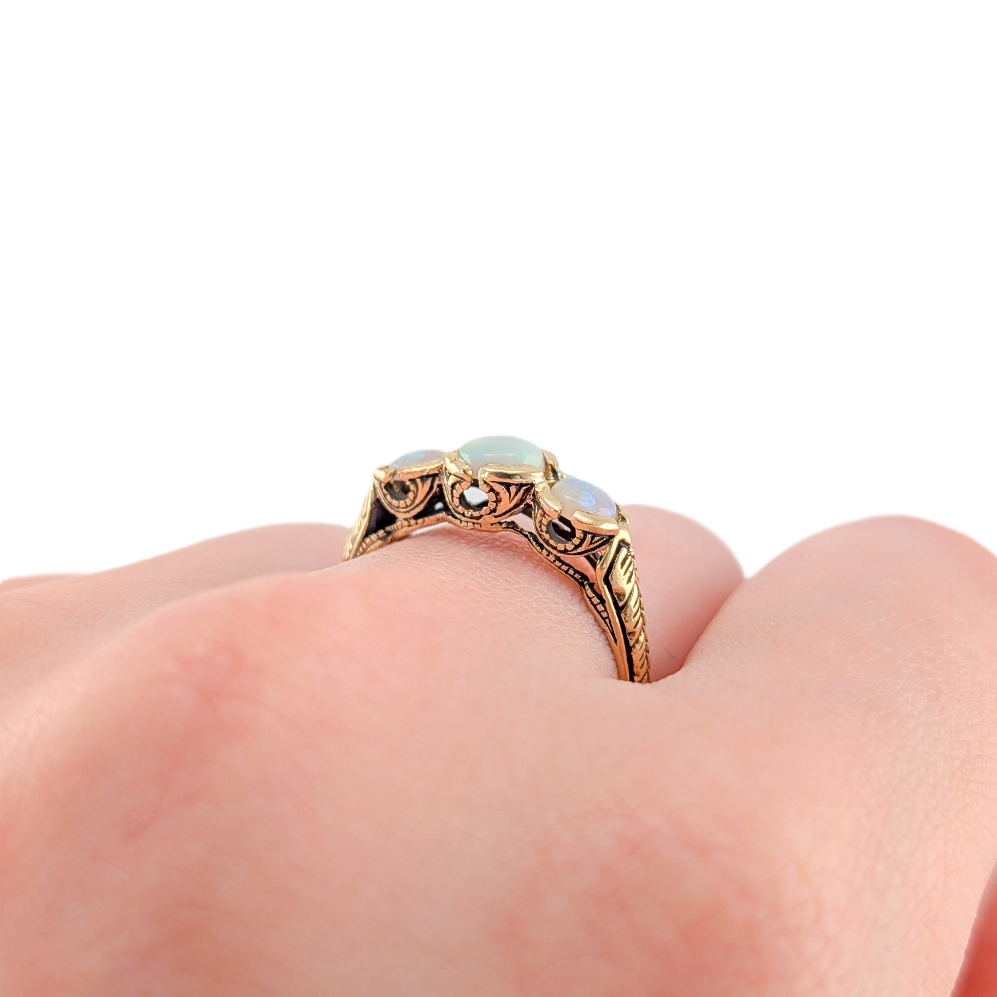 Vintage 9K Gold Three-Stone Opal Ring with Engraved Shoulders