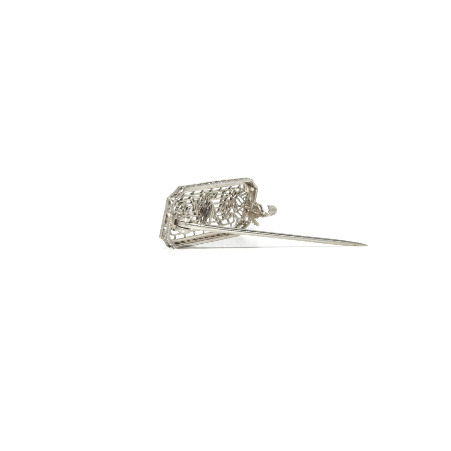 14k white gold art deco brooch with floral design on a white background