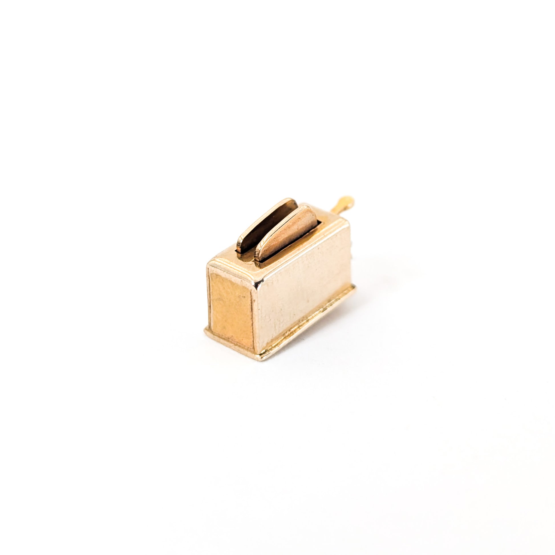 14k Gold toaster mechanical charm on a white background