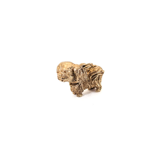 14k Gold Vintage Pekingese mechanical charm on a white background
