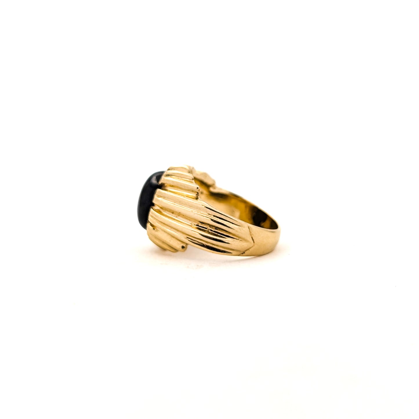 14K gold ring with a black star sapphire gemstone on a white background