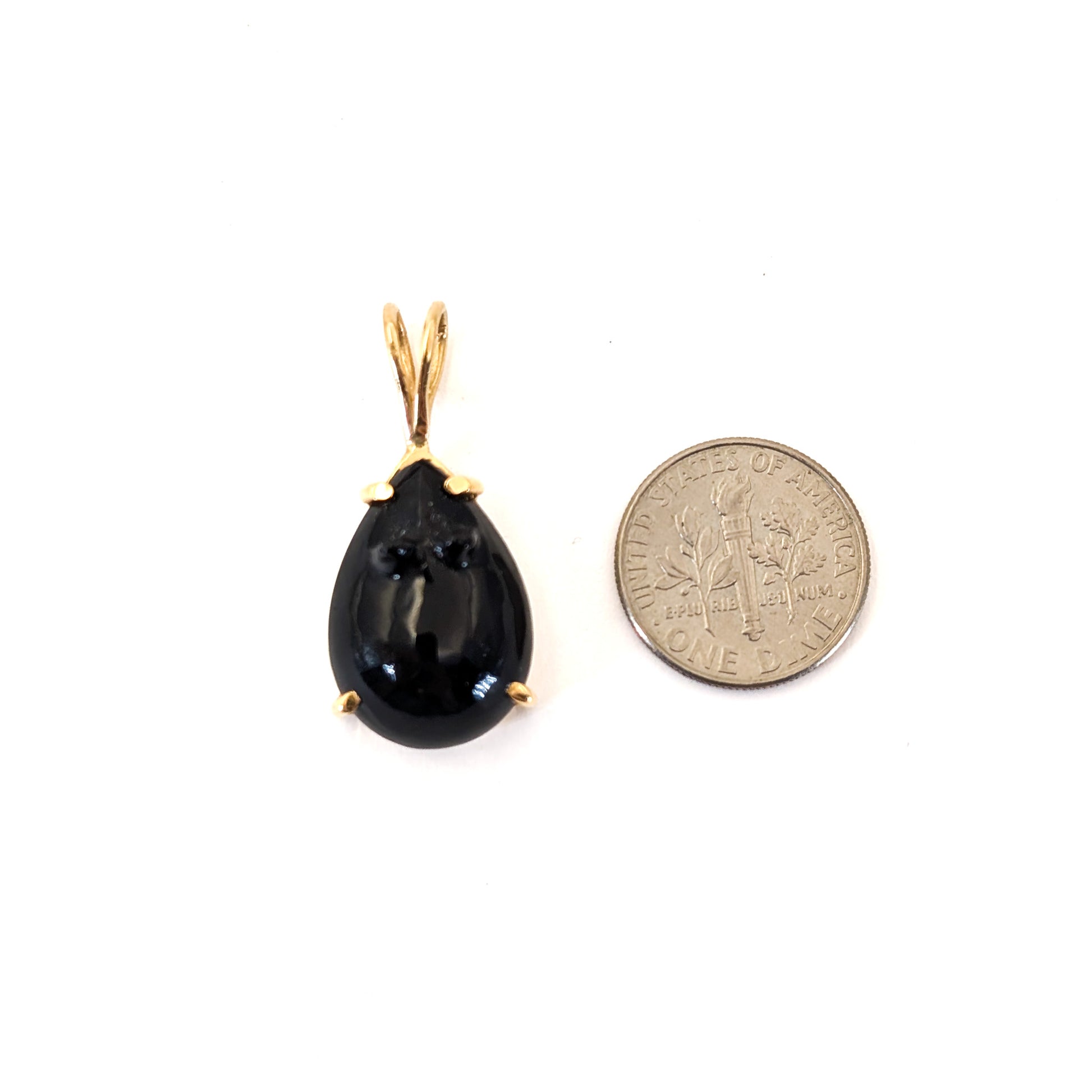 Black onyx teardrop pendant carved in a mouse with 14k gold setting on a white background