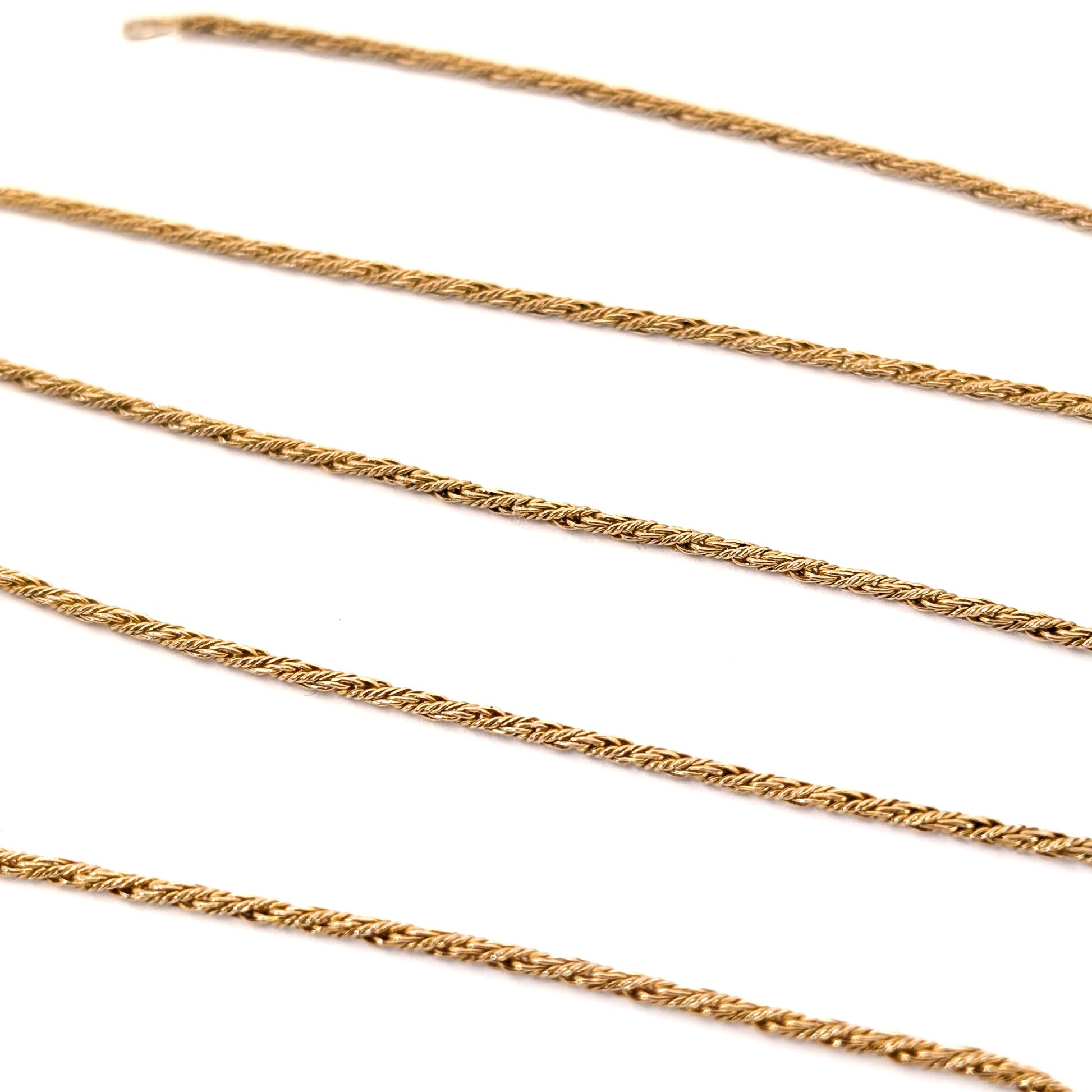 14K Gold chain necklace on a white background