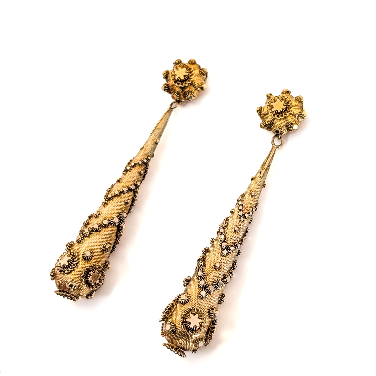 Pair of gold Georgian-era earrings with intricate designs on a white background. Crafted in solid 14K yellow gold, they feature the highly skilled and delicate art of cannetille work, They are a breathtaking example of early 19th-century goldsmithing.