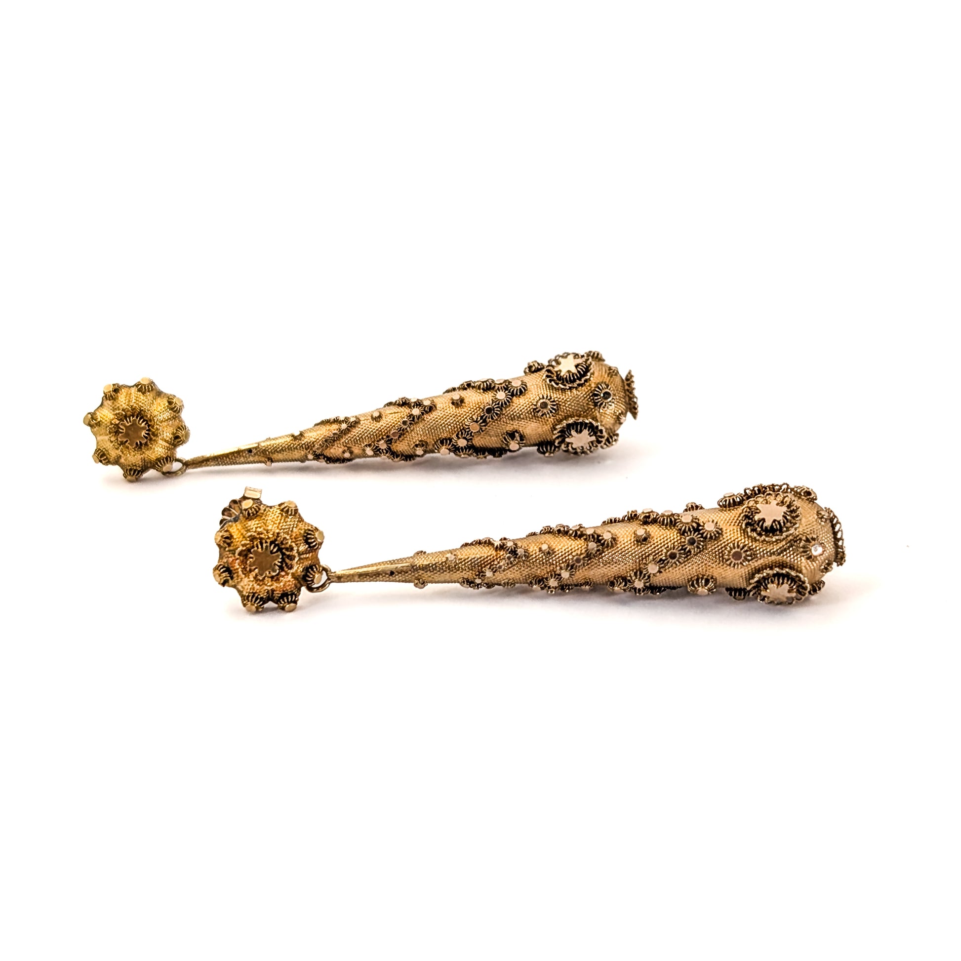 Pair of gold Georgian-era earrings with intricate designs on a white background. Crafted in solid 14K yellow gold, they feature the highly skilled and delicate art of cannetille work, They are a breathtaking example of early 19th-century goldsmithing.
