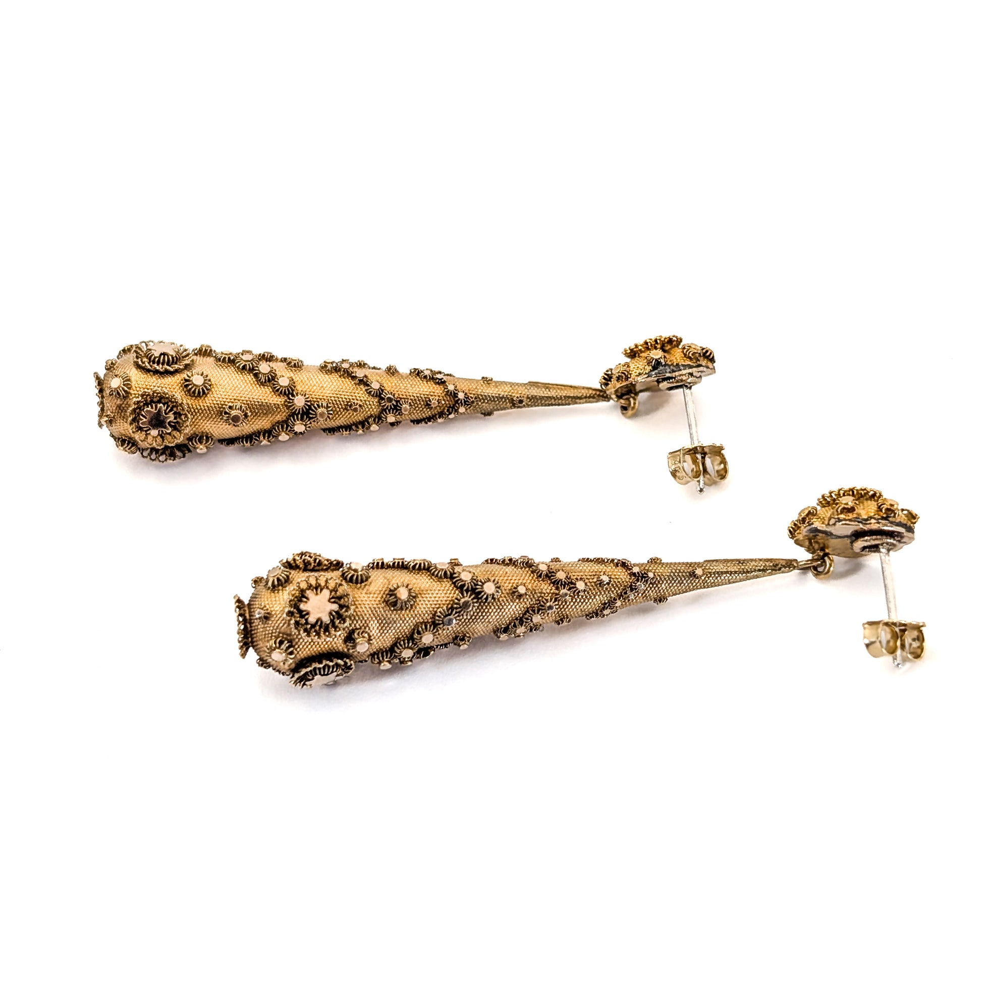 Pair of gold Georgian-era earrings with intricate designs on a white background. Crafted in solid 14K yellow gold, they feature the highly skilled and delicate art of cannetille work, They are a breathtaking example of early 19th-century goldsmithing.