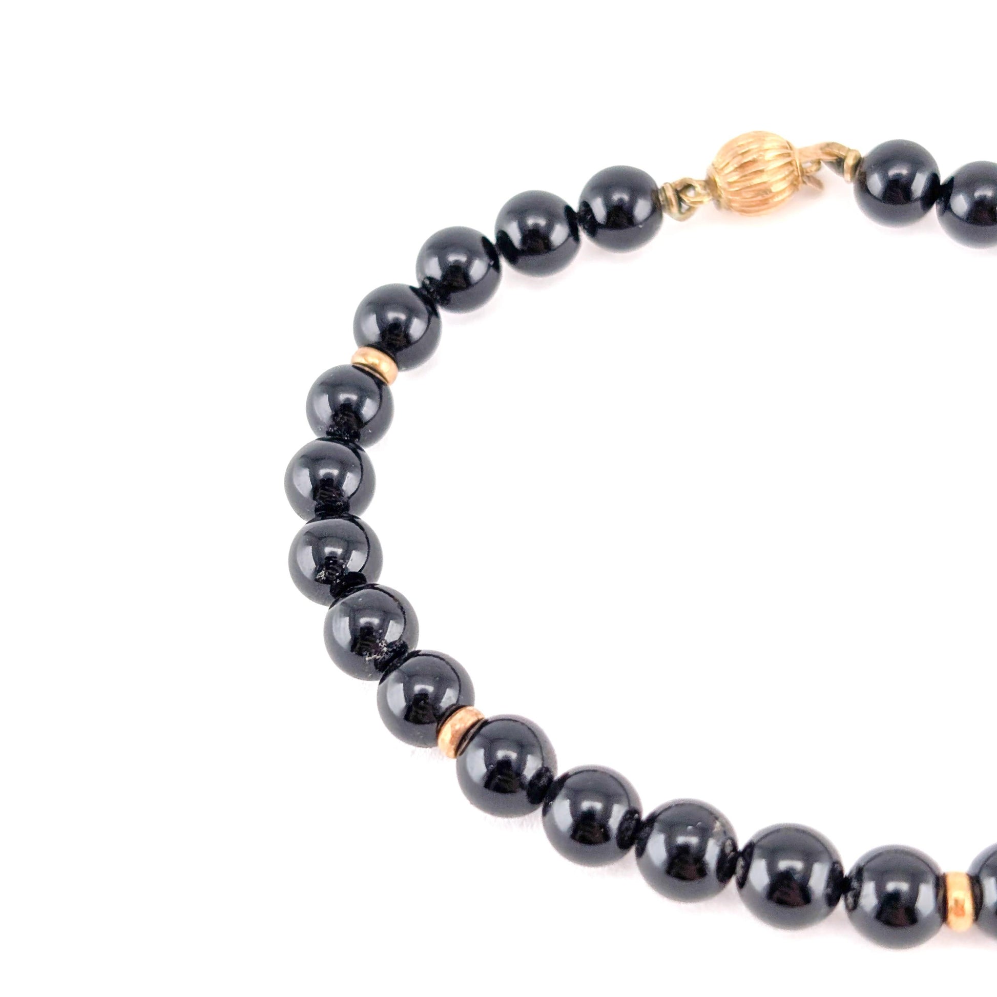 Elegant Black Onyx Beaded Bracelet with 14k Gold Accents 7.5"
